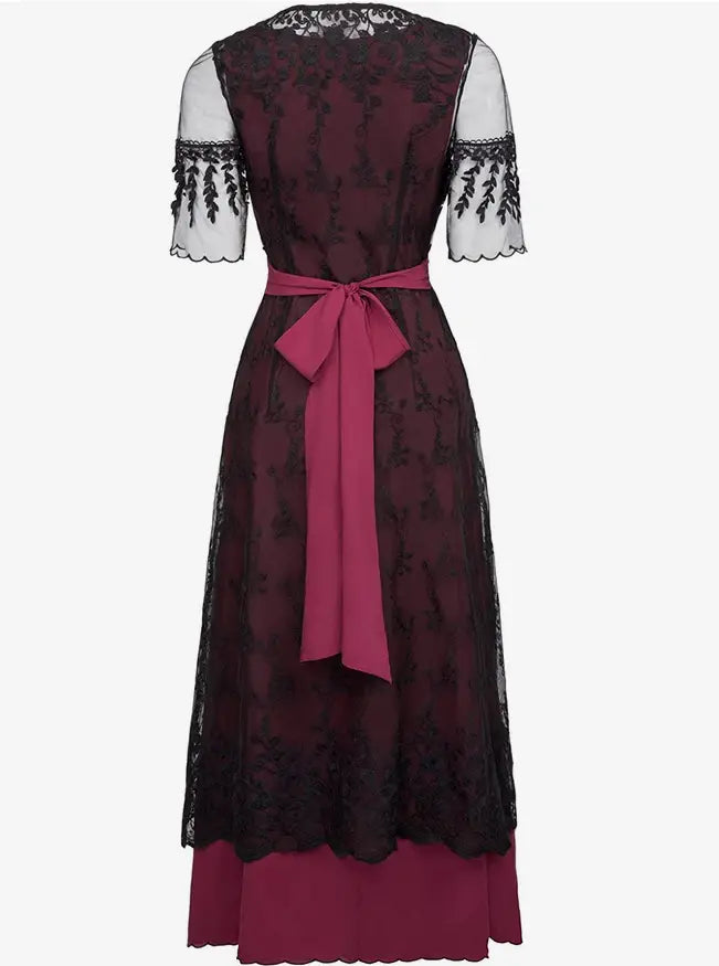 Women’s dark red midi dirndl dress with black lace overlay and satin bow, size small