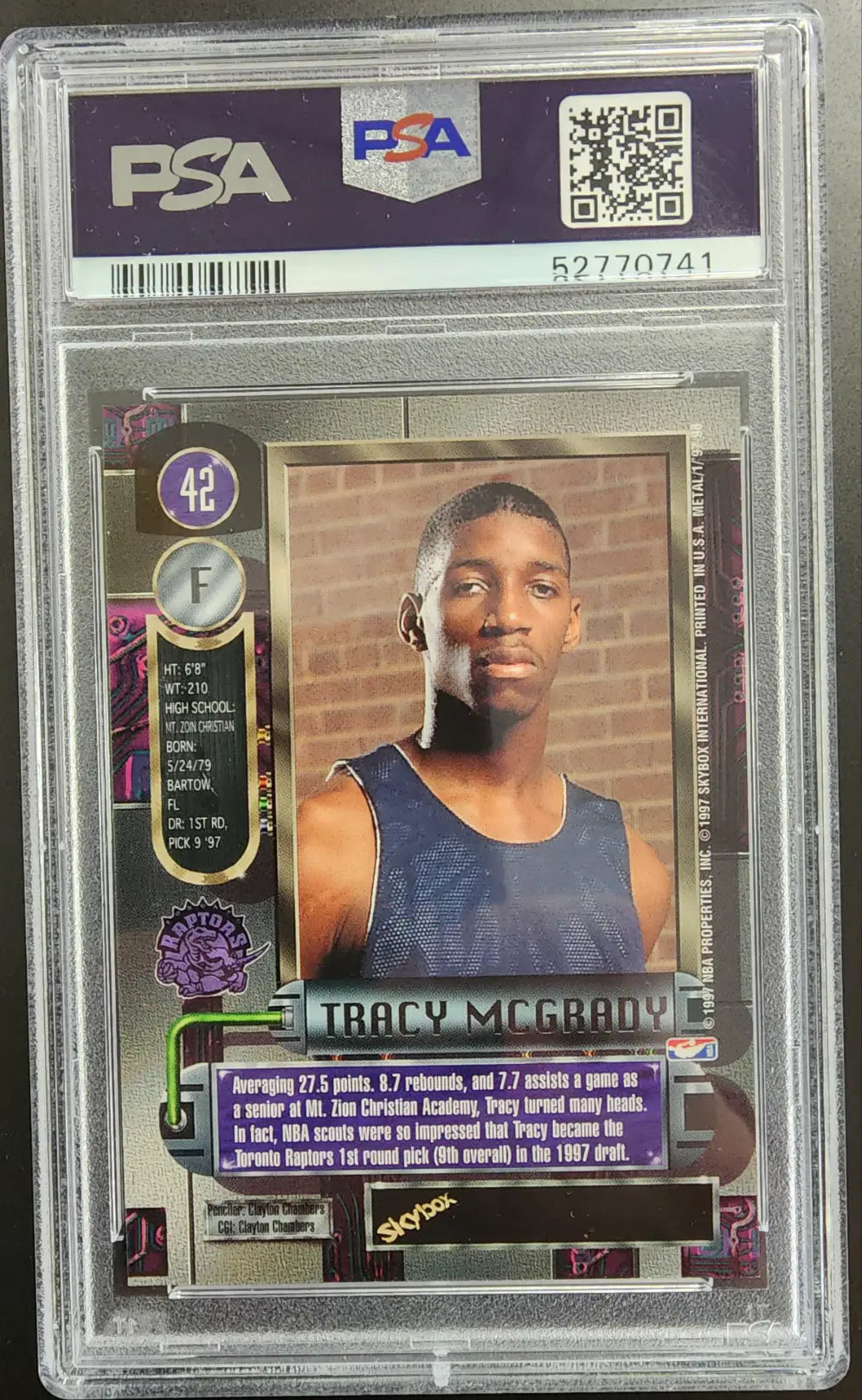 PSA 10 Gem Mint Tracy McGrady 1997 Metal Universe Rookie basketball card in navy tank top