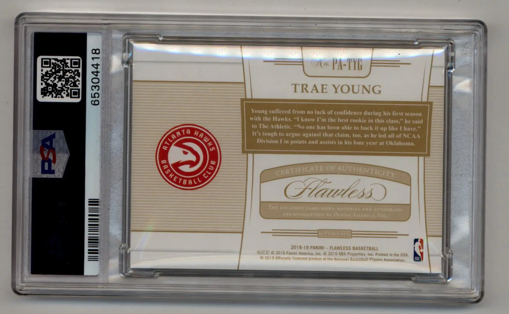 Clear plastic basketball trading card of Trae Young with Flawless Patch Auto branding