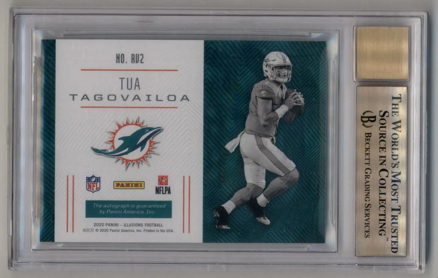 Football trading card of Tua Tagovailoa in a protective case, Panini Illusions Rookie Vision Signatures