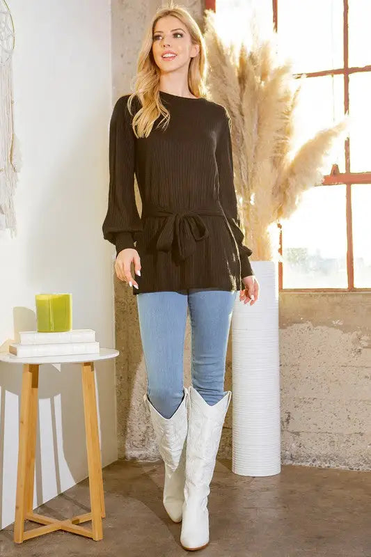 Women’s black long-sleeve ribbed tunic top with waist tie and tie waist detail