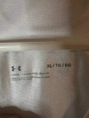 White Under Armour Men’s XL Jersey shirt displayed for athletic wear and sports activities