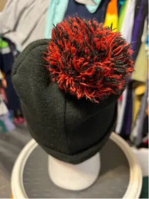 Unisex Batman DC Comics Beanie Hat featuring a black design with a red and black speckled pom-pom, perfect for Harley Quinn fans