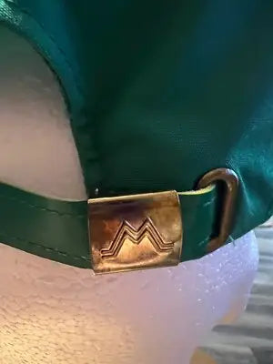Green casino magic baseball cap with embossed M clasp for Unisex Mohr’s Hat