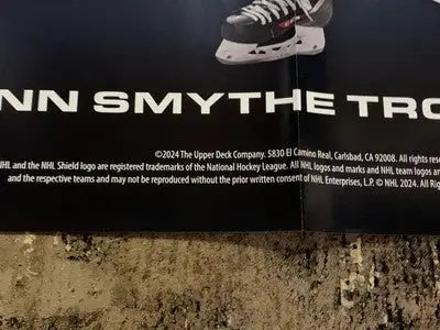 Hockey skate shown on Connor McDavid NHL promotional poster featuring Edmonton Oilers