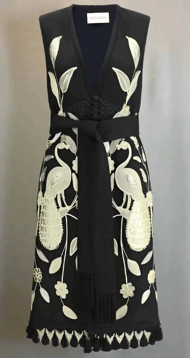 Black sleeveless V-neck dress with cream embroidered bird and leaf details, Valentino embroidered long vest