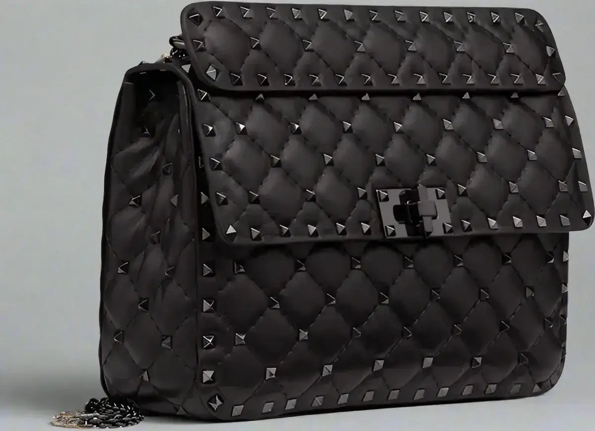 Valentino Garavani black nappa leather spike bag with studded details and metal clasp
