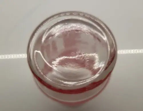 Glass jar with red and white stripes for Ohio State Championship souvenir drinking glass