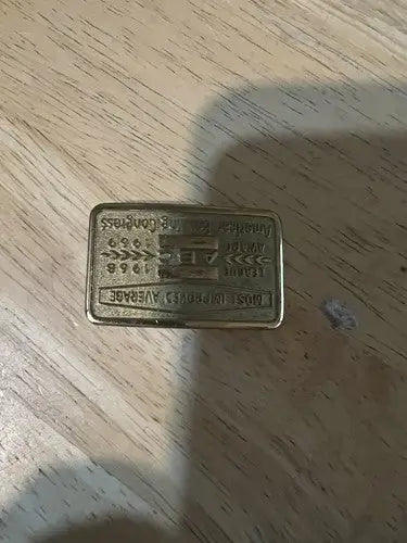 Gold-colored metal plaque belt buckle featuring American Bowling Congress emblem and lettering