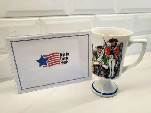 Footed mug featuring Revolutionary War Red Coats figures for vintage tea or coffee