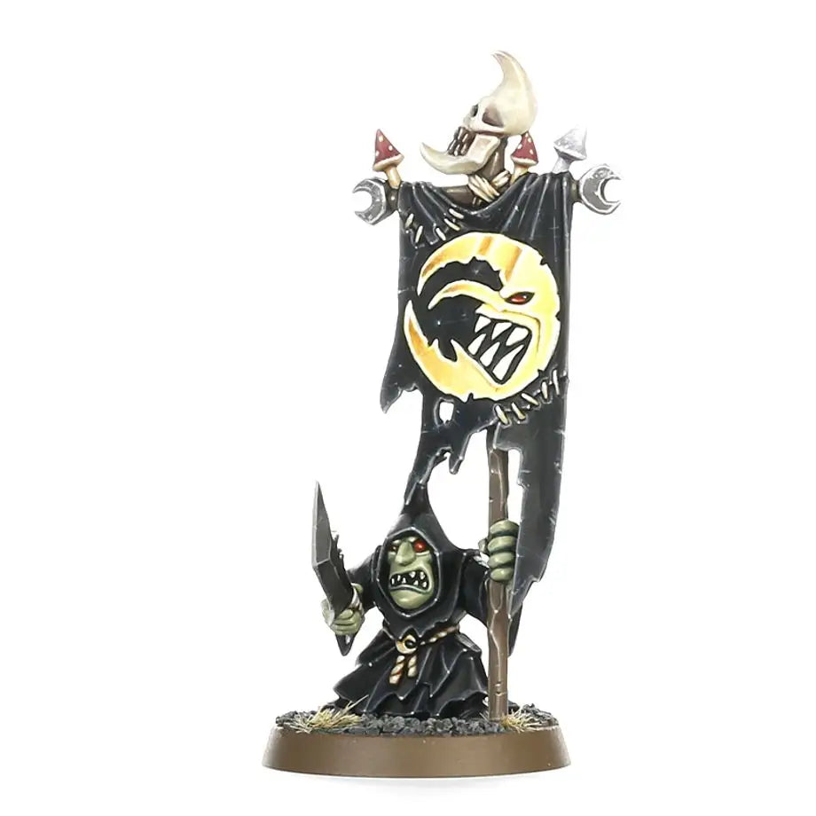 Miniature goblin holding a banner from Gloomspite Gitz Stabbas in Warhammer Age of Sigmar