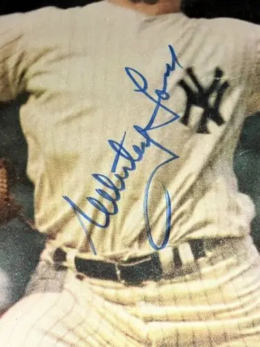 Autographed Whitey Ford baseball jersey with Sports Illustrated and Beckett Authentication Services