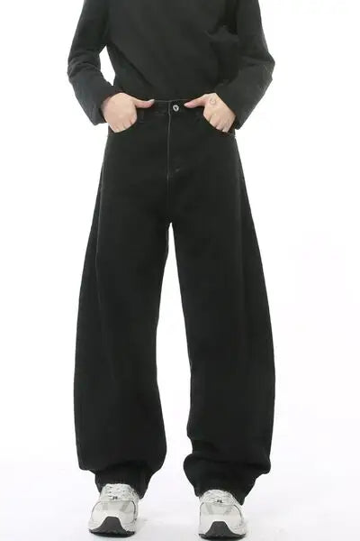 Black baggy denim pants with wide legs and pockets for a stylish casual look