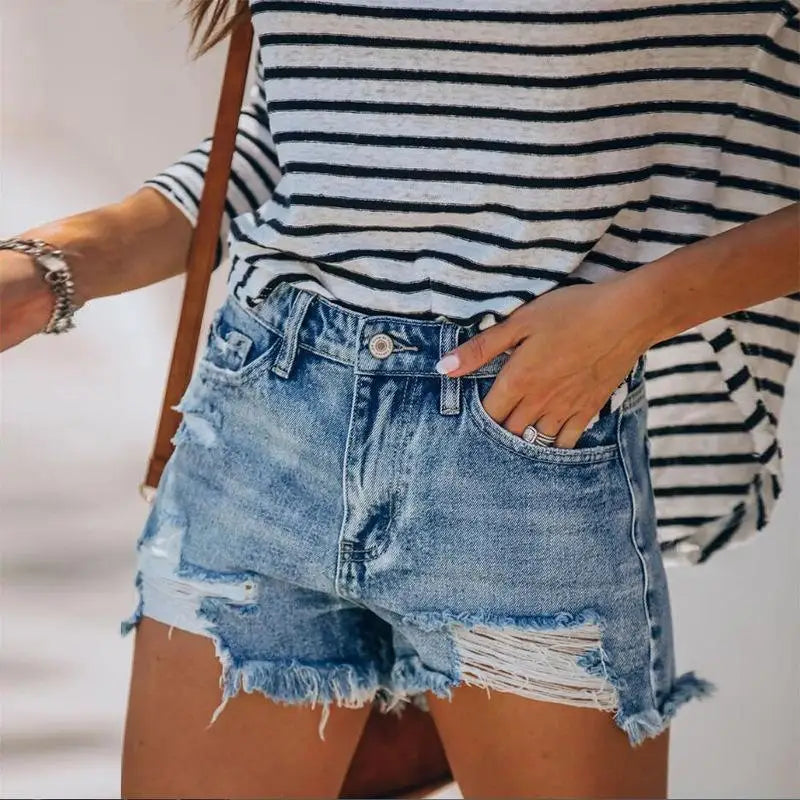 Women fringe denim jeans shorts featuring distressed light-wash denim and striped top