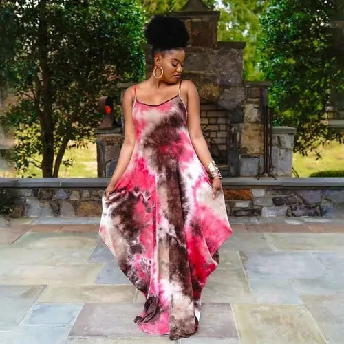 Woman modeling a fashion casual long tie-dye maxi dress with spaghetti straps