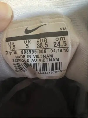 White Nike Flex Contact Running Shoes size label for Women’s Nike Flex Contact running shoes