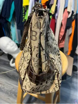 Sag Harbor beige and brown tote bag with crocodile-embossed trim and patterned shoulder strap