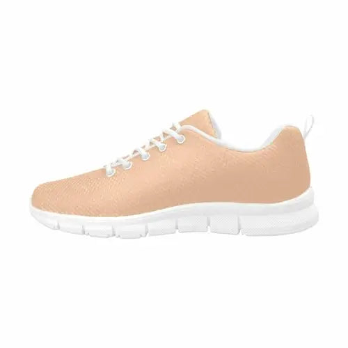 Light peach-colored sports shoes with white laces and sole, deep peach pink running shoes