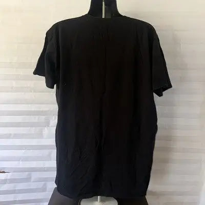 Black short-sleeve T-shirt on mannequin featuring WWE logo for wrestling fans