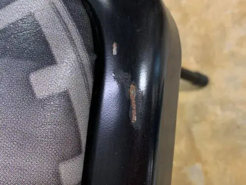 Worn black chair frame from WWE Survivor Series Ringside VIP Event Chair Greensboro Coliseum