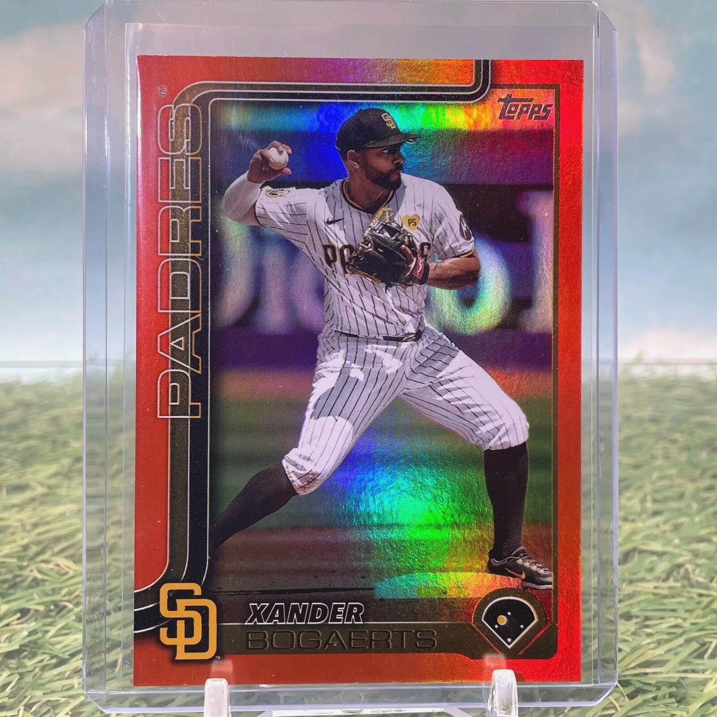 Xander Bogaerts baseball card featuring orange rainbow foil from 2025 Topps Series 1