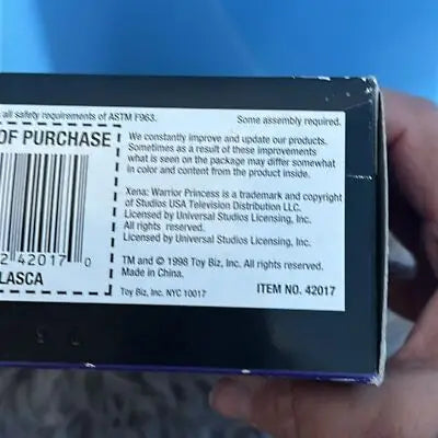 Black rectangular box with white label featuring product info barcode and legal text for Xena Series 2 Velasca Action Figure