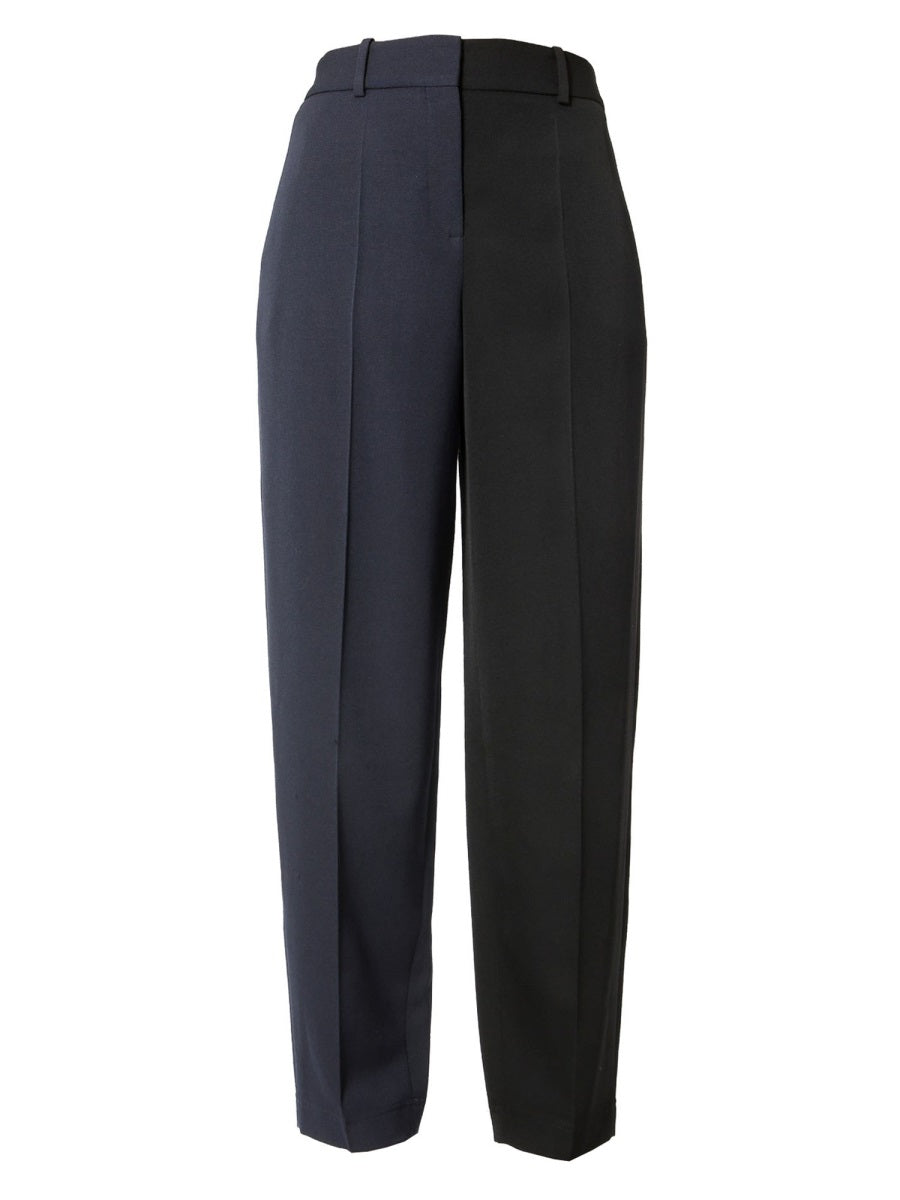 Two-tone navy and black high-waisted trousers with a belt loop.
