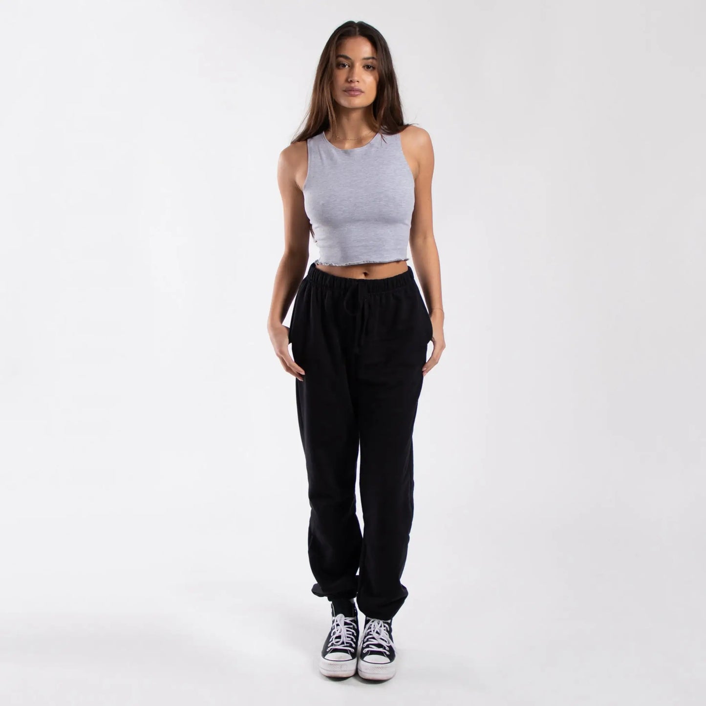 Lavender lettuce trim muscle tank with black jogger pants and white sneakers - info otlapparel