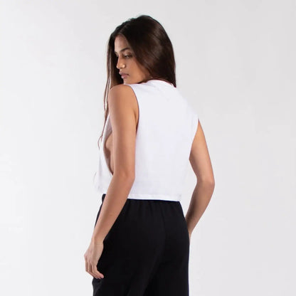 White sleeveless garment dyed muscle tank with black pants for women’s casual style