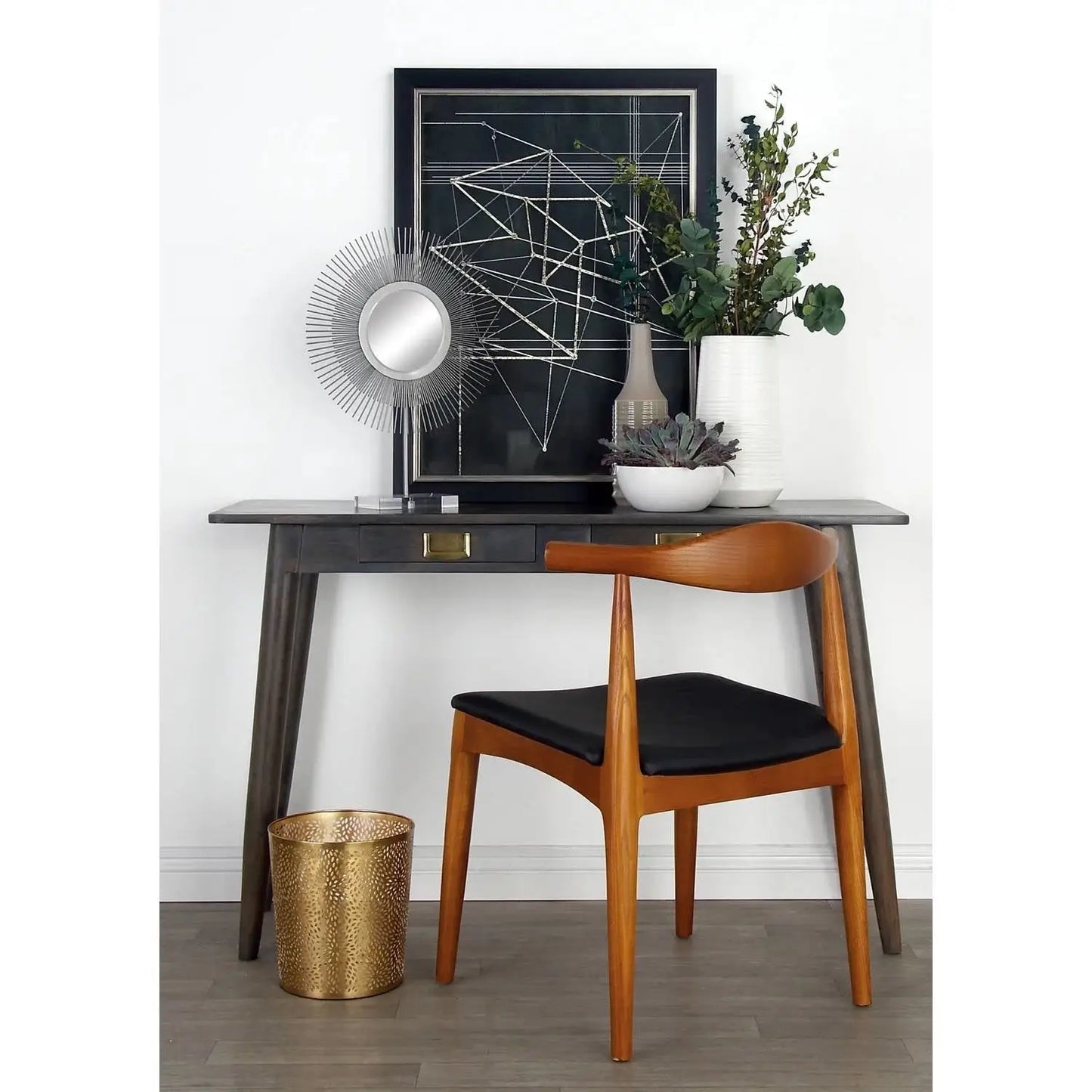 Dark wood desk with modern design and 1.3 gallon round perforated copper waste basket