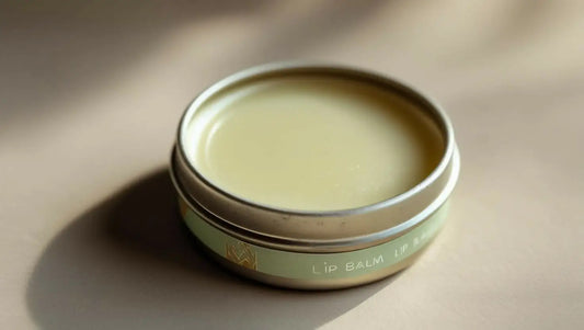 Open tin of light green 1 Ounce Lip Balm with smooth texture and natural appearance