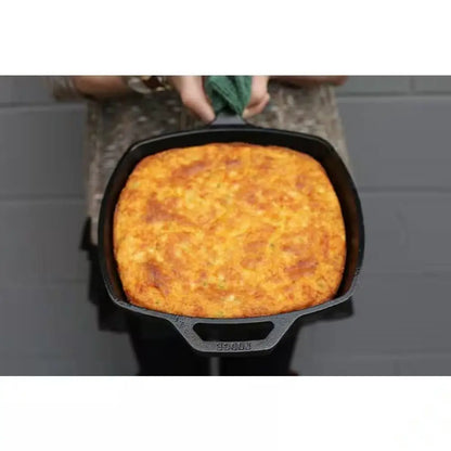 Square cast iron skillet with golden-brown cornbread, made in USA, 10.5-inch skillet