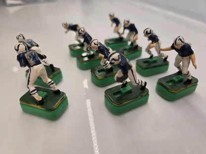 Miniature Indianapolis Colts electronic football player figurines on green bases for Colts electronic football fans