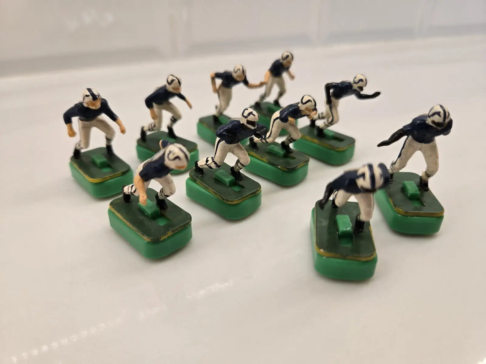 Vintage electric football figures featuring Indianapolis Colts Electronic players