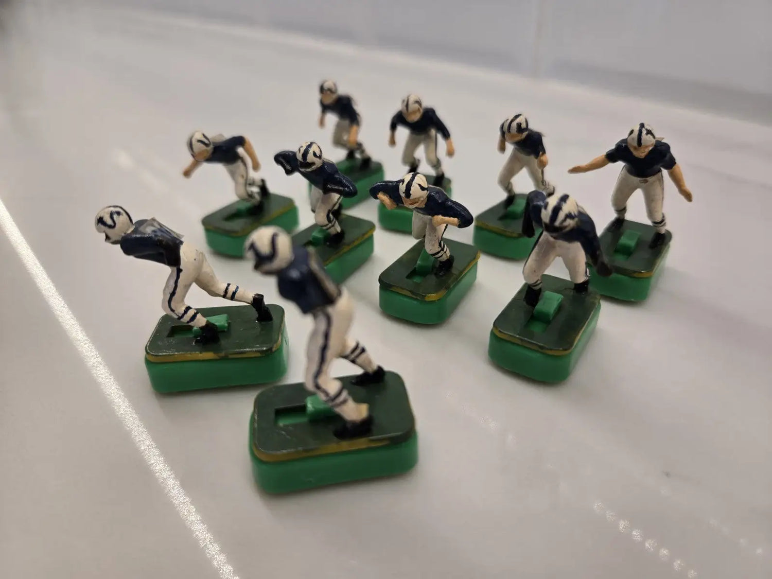 Vintage electric football figures for Indianapolis Colts electronic gameplay display