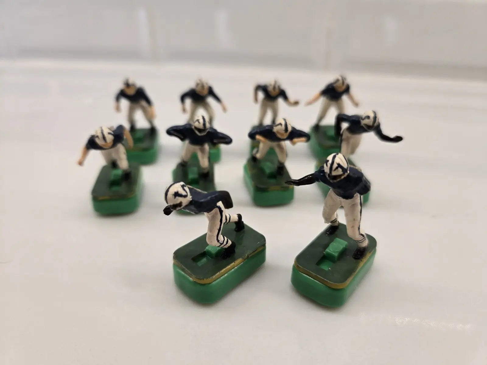 Vintage Indianapolis Colts electronic football figures in damaged condition