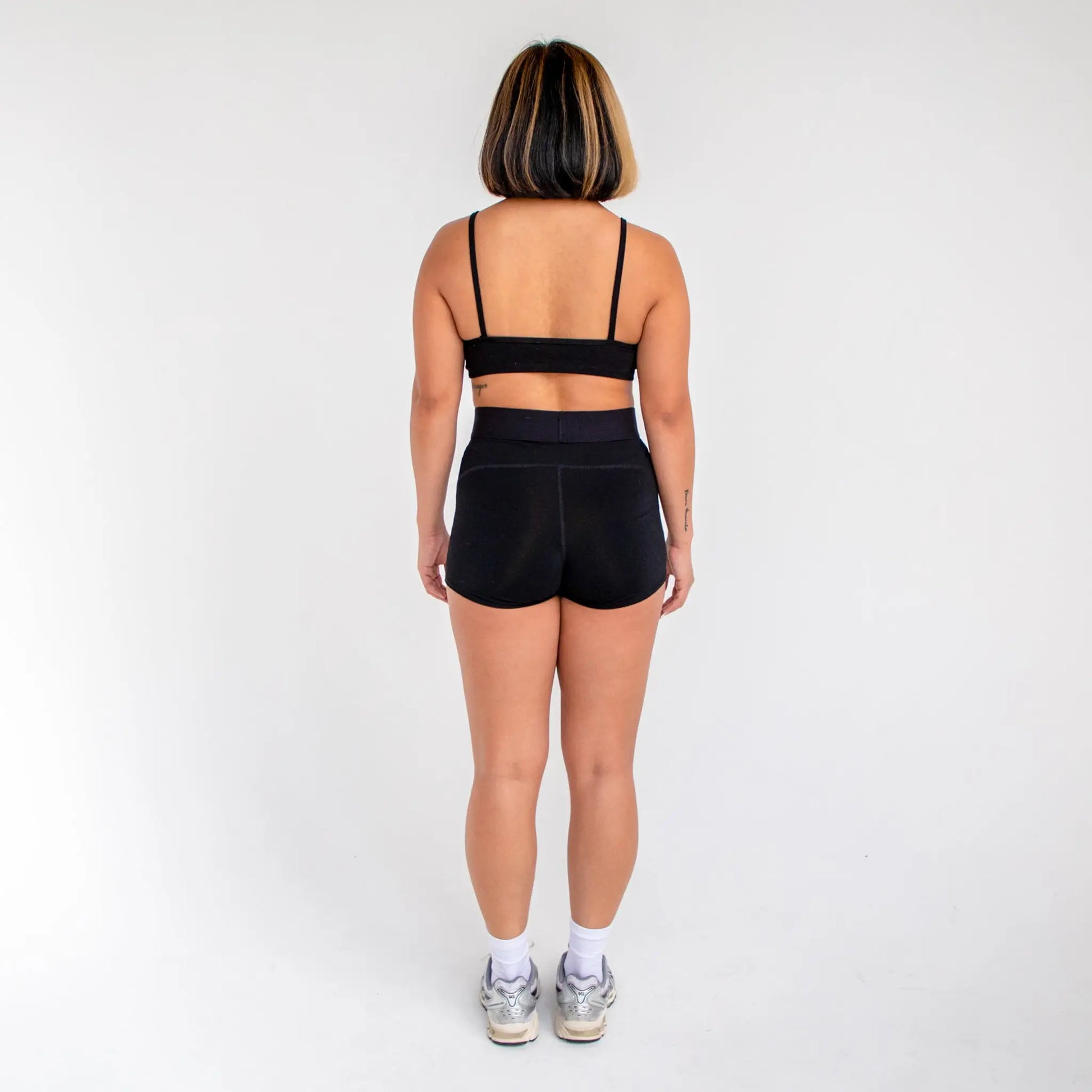 Black athletic shorts with high waist and elastic band for women - info otlapparel