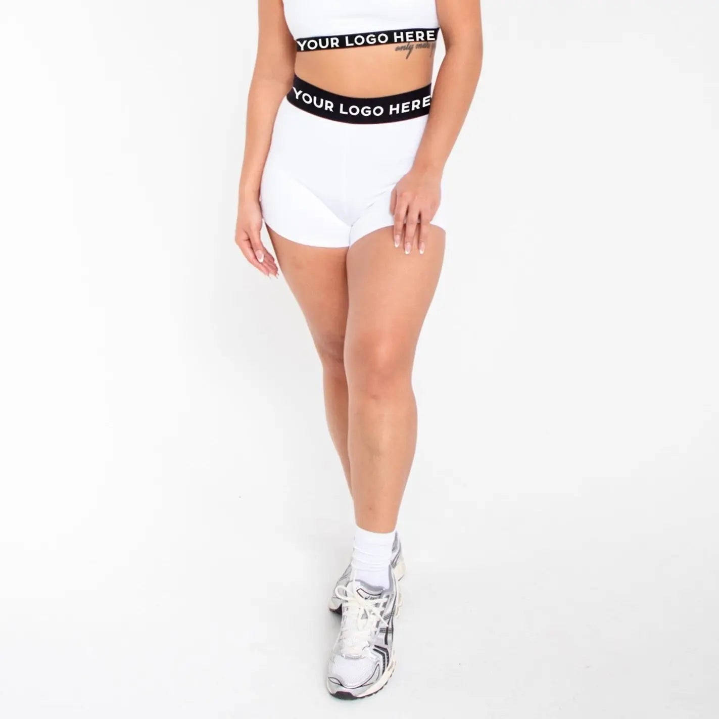 White athletic shorts with black waistband and logo from 1001BD Women’s Banded Pro Shorts for info otlapparel