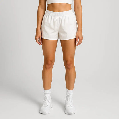 White women’s athletic shorts with elastic waistband and drawstring for activewear