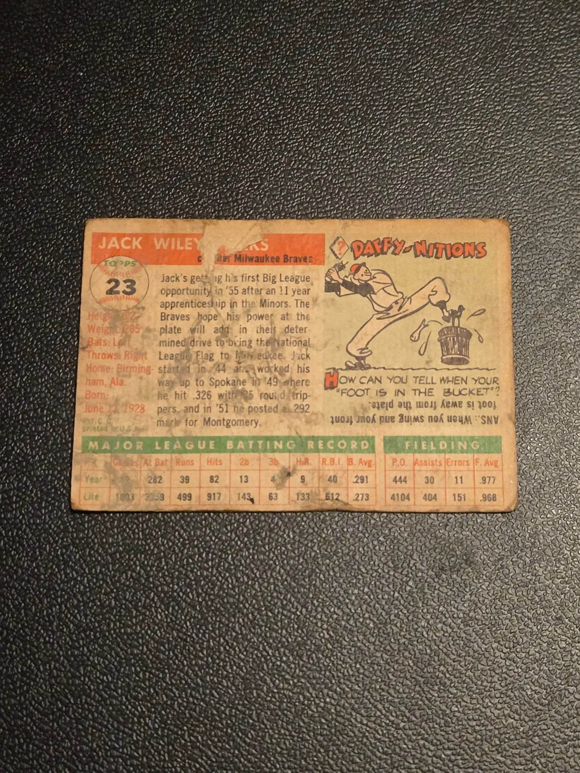 Aged 1955 Topps Jack Parks baseball trading card with cartoon illustration