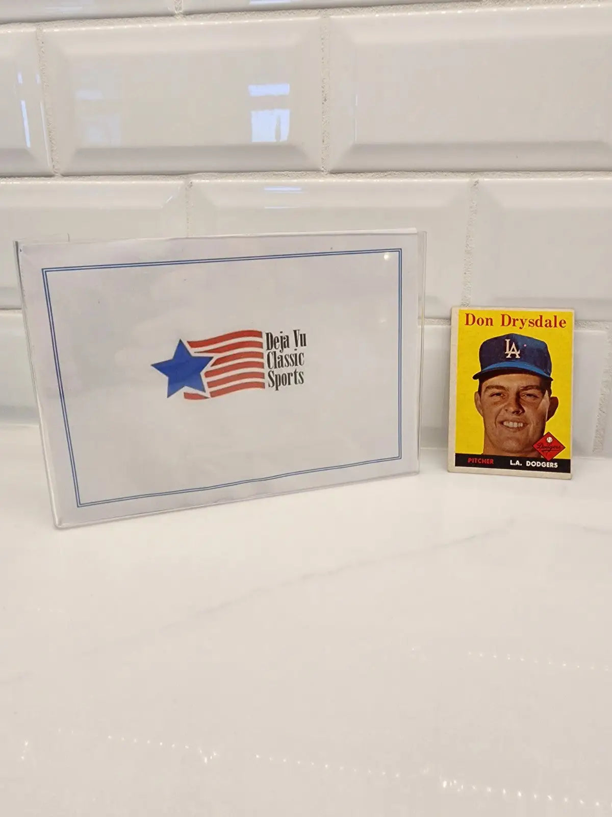 Trading card of Don Drysdale in protective case from 1958 Topps Don Drysdale series
