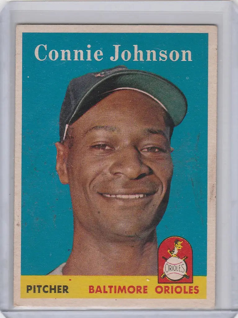 Baseball card of Connie Johnson, smiling African American player, Baltimore Orioles