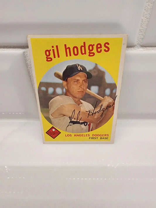 Vintage 1959 Topps Gil Hodges trading card featuring Topps Gil Hodges baseball player