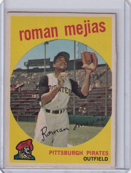 Baseball card of Roman Mejias, Pittsburgh Pirates outfielder in catching pose, Topps Baseball