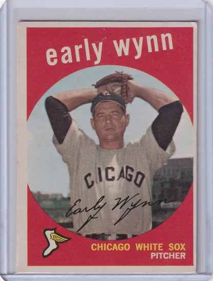 Vintage Topps Baseball card of Early Wynn pitching for the Chicago White Sox