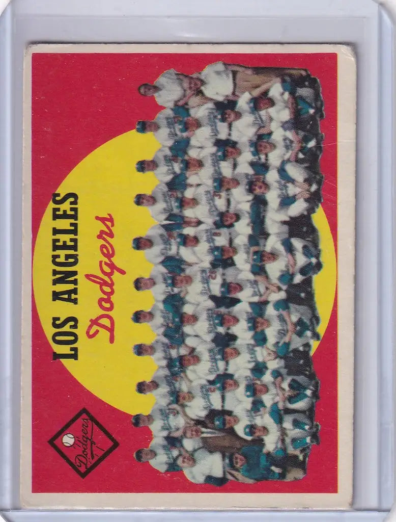 Vintage baseball card featuring Los Angeles Dodgers team photo and checklist