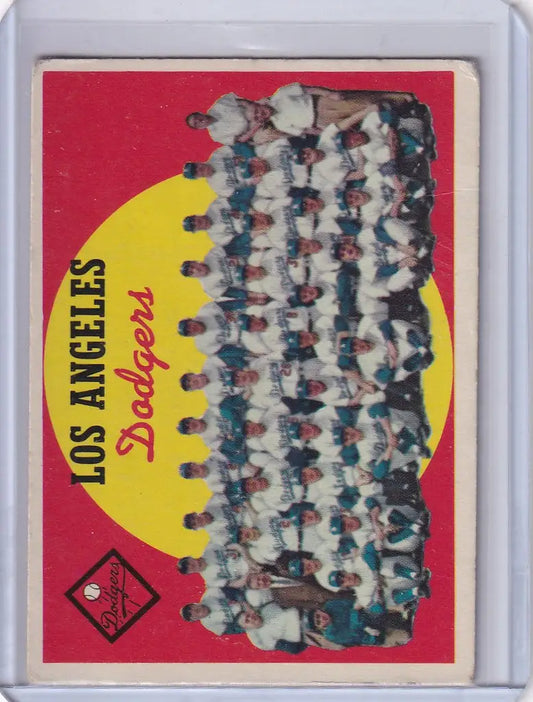 Vintage baseball card featuring Los Angeles Dodgers team photo and checklist