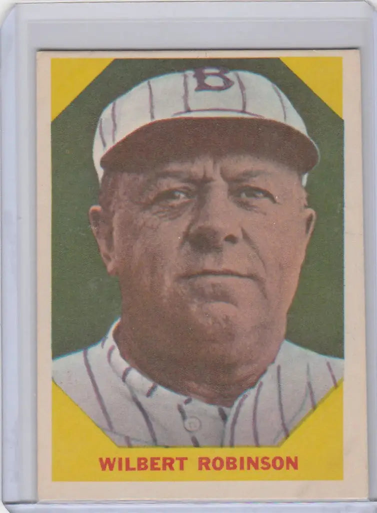 Fleer Baseball Greats card of Wilbert Robinson Baltimore in white uniform and cap