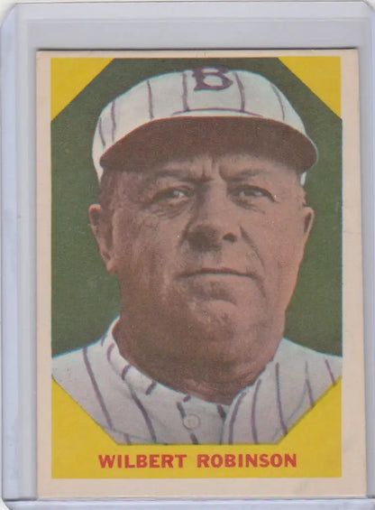 Fleer Baseball Greats card of Wilbert Robinson Baltimore in white uniform and cap