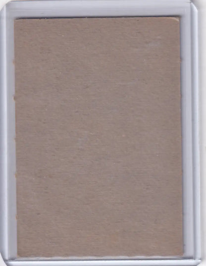 Blank back of 1961 Post Baseball Jack Brandt Baltimore Orioles trading card in plastic sleeve